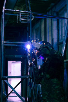 Metal Welding For Decorations.  Man At Work