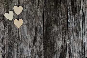 hearts on rustic wooden background