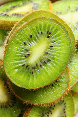 Slices of fresh kiwi as background, closeup