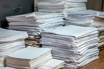 pile of paper documents in the office, paper trash, waste paper