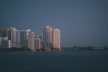 Fototapeta na wymiar city skyline at night urban MIAMI FLORIDA buildings sea bridge panorama 