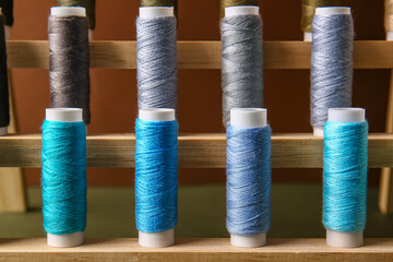 Set of colorful sewing threads on coils, closeup
