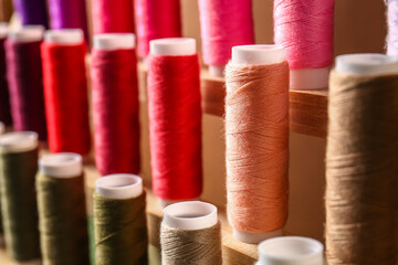 Set of different colorful sewing threads, closeup