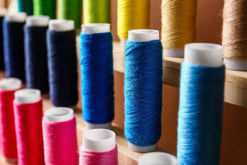 Closeup view of different colorful sewing threads