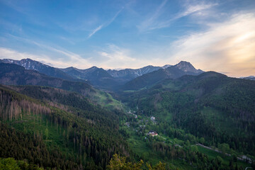 View from Nosal to Kuznice with the peaks of the Tatra Mountains in the background.