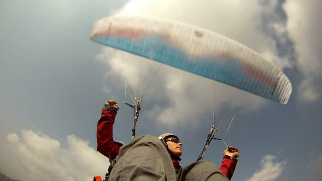 Paragliding in a busy house thermal