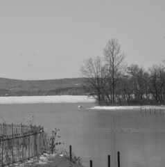 Icy rive with smog in the morning  in the Canadian cold winter in the province of Quebec