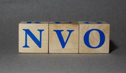 January 19, 2022. New York, USA. Stock Ticker symbol of Novo Nordisk NVO made of wooden cubes on a gray background.