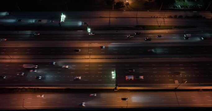 Aerial overhead shot of traffic on highway at night