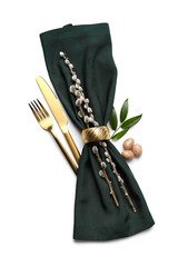 Stylish cutlery for Easter celebration on white background
