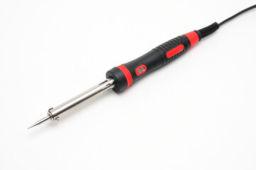 Soldering iron for electricians on a white background - obrazy, fototapety, plakaty