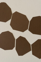 polygonal shaped paper arranged in an abstract composition