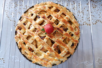 Homemade apple pie on table, top view. Flat lay, overhead, from above.