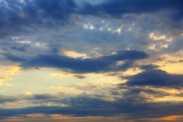 Dim Clouds . Cloudscape with evening light 