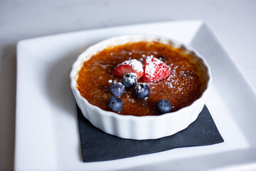 A view of a plate of creme brulee.