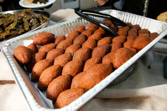 A view of a catering container of kibbeh.