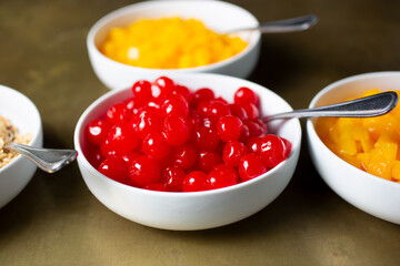 A view of a bowl of maraschino cherries.agriculture, aisle, background, bowl, can, canned, cook, crop, department, farm, farmer, fresh, fruit, garden, green, grocery, grown, healthy, herb, ingredient,