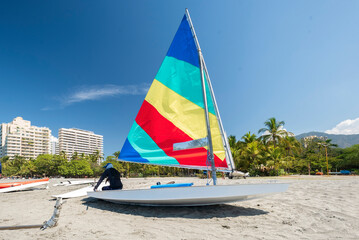 Colorful sail boat on the beach