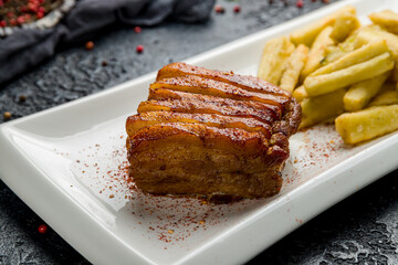 pork ribs in Chinese on dark stone table