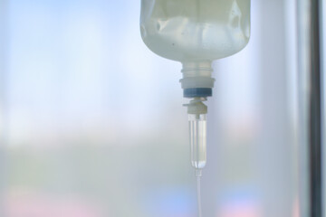 Closeup shot of clinical surgery injection infusion intravenous fluid liquid normal saline solution...