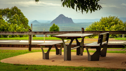 Picnic table view a view to Glass House mountains in Queensland, Australia