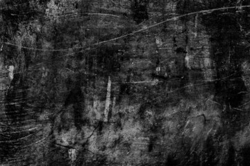 Old abandoned dark concrete floor surface with scratches and spots for texture background
