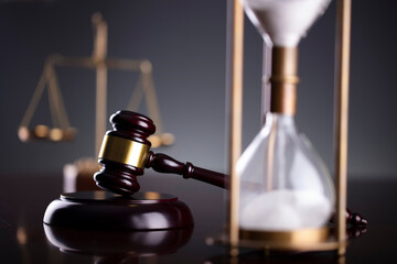 Law symbols composition. Law and justice concept.  Gavel and scale on gray background.