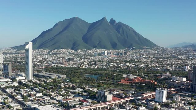 Aerial drone view of Cerro de La Silla and parc Fundidora in Monterrey, Mexico