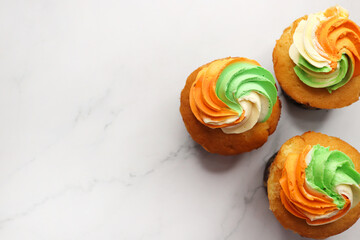 Tiranga Cupcake or Tricolor Cupcake with Indian National Flag colors frosting. saffron or orange,...