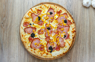 pizza with ham chesse onion corn and truffles