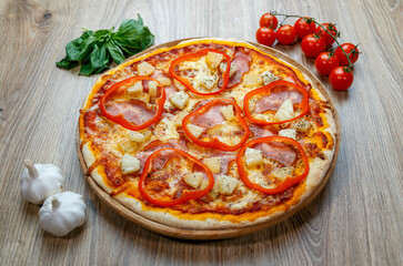 pizza with ham, mozzarella, red pepper and pineapple