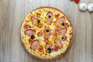 pizza with ham chesse onion corn and truffles