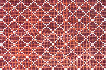 Red and white mosaic background tiles. Closeup cleaning geometric mosaic   street wall texture background