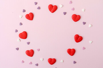 sugar hearts on pink background