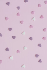 sugar hearts on pink background