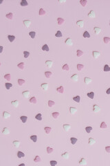 sugar hearts on pink background