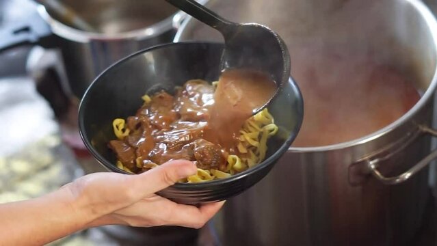 Khao soi - Traditional Thai Food, Thai curry with  A noodle dish in a yellow curry. 
Khao soy a famous northern Thai food
