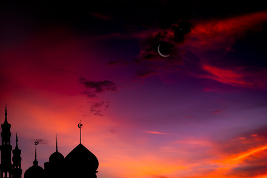 Mosques Dome shadow on twilight sky night red dark black with Crescent Moon ramadan islamic religion symbols. Islamic new year Muharram, Mubarak, Eid al-fitr, Eid al-Adha, arabic concept.