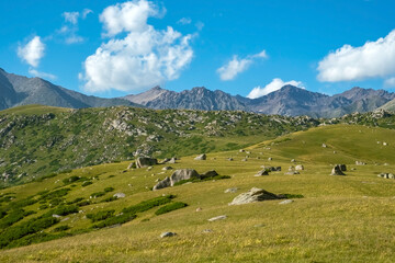 Fototapeta na wymiar Beautiful mountain stone valley landscape with cloudy sky background.