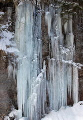 long icicles on a precipice