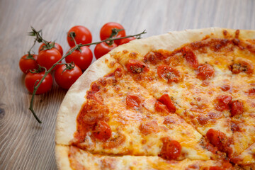 pizza quatro formaggi and cherry tomato