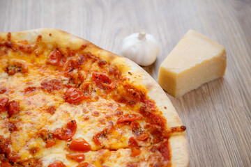 pizza quatro formaggi and cherry tomato