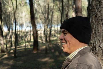 Mature man smiling in nature