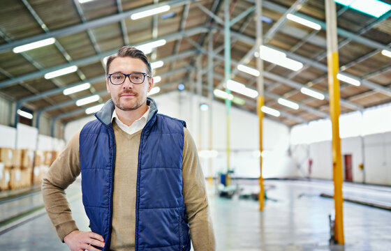 Organization is key in distribution. Portrait of a man working in a distribution warehouse.