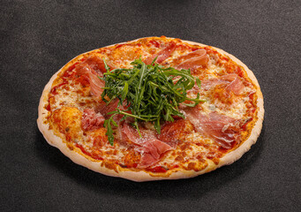 Pizza with parma and rucola