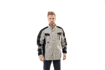Obraz premium A middle-aged white man wearing a gray uniform standing over isolated white background looks happy. Worker and builder concept, mannequin.