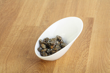 Salted marinated capers snack appetiser
