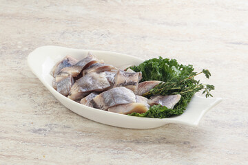 Herring fillet slice on the bowl