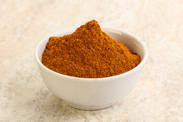 Dry Paprika powder in the bowl