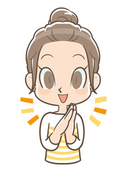 手を合わせて喜ぶ団子頭の女の子